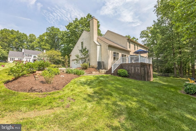 1337 Pennsridge Pl, Downingtown, PA 19335 - rear view of property with stucco siding, a lawn, a deck, stairs, and a chimney