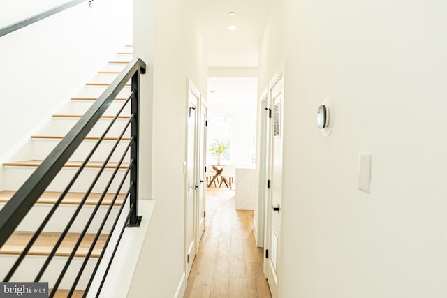 2517 Ontario Rd NW Unit Ph8, Washington, DC 20009 - corridor with light wood-style floors, stairs, and recessed lighting