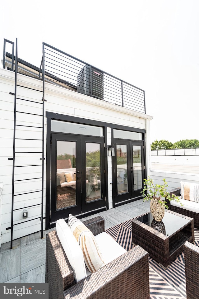 2517 Ontario Rd NW Unit Ph8, Washington, DC 20009 - wooden deck with french doors and outdoor lounge area