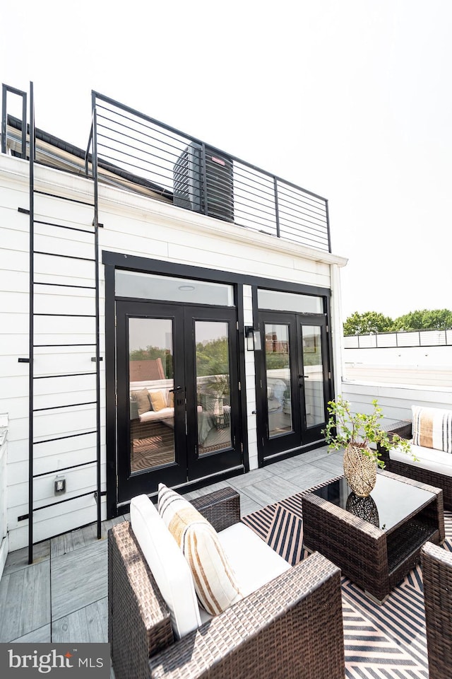 2517 Ontario Rd NW Unit Ph8, Washington, DC 20009 - deck with french doors and an outdoor hangout area