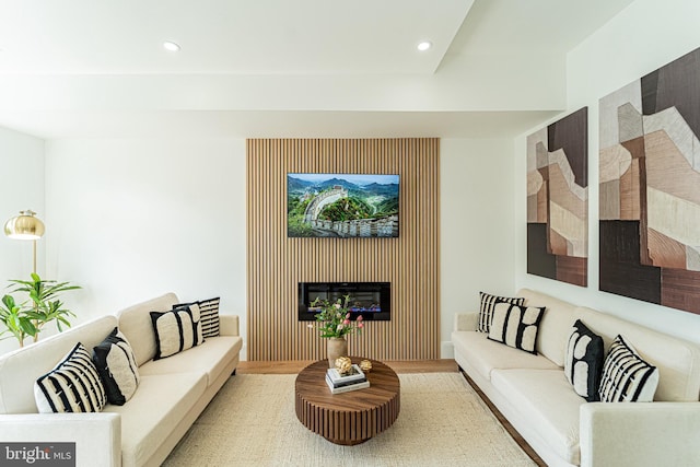 2517 Ontario Rd NW Unit Ph8, Washington, DC 20009 - living room with recessed lighting, a glass covered fireplace, and wood finished floors