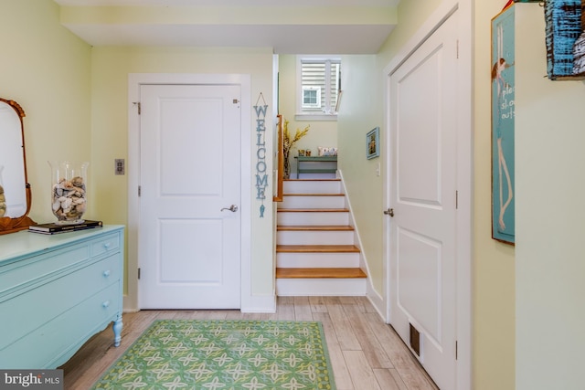 120 Read Ave, Dewey Beach, DE 19971 - foyer with light wood-style flooring and stairway