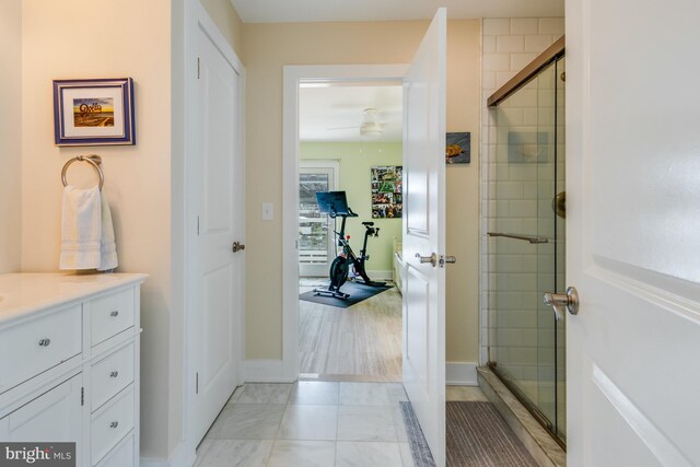 120 Read Ave, Dewey Beach, DE 19971 - full bathroom with baseboards, a tile shower, and vanity