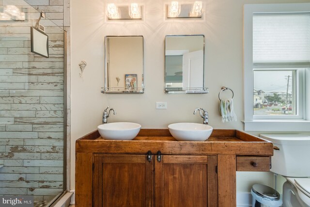 120 Read Ave, Dewey Beach, DE 19971 - bathroom with toilet, double vanity, and a shower stall