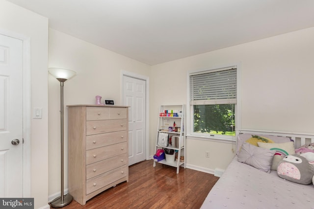 680 Geneva Dr, Westminster, MD 21157 - bedroom with dark wood-style flooring and baseboards