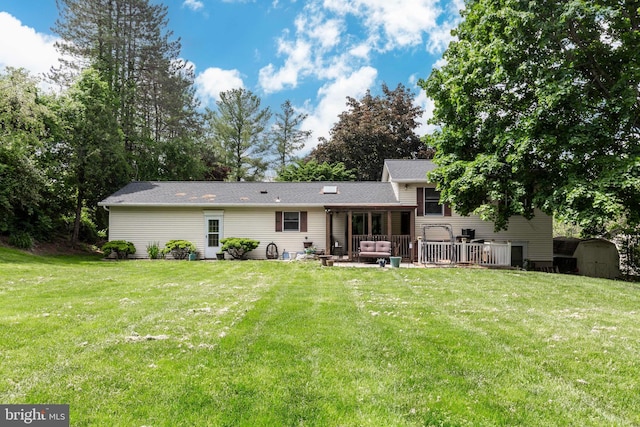 680 Geneva Dr, Westminster, MD 21157 - rear view of house featuring a lawn and a wooden deck