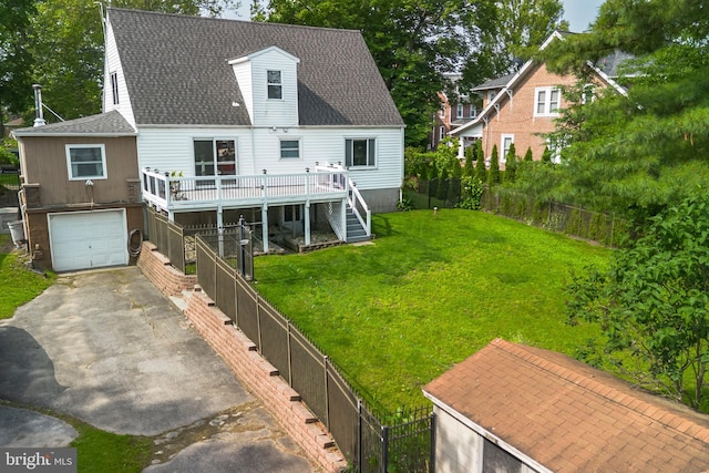 225 E State St, Coopersburg, PA 18036 - back of property with driveway, stairway, a wooden deck, a garage, and roof with shingles