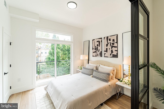 2517 Ontario Rd NW Unit 6, Washington, DC 20009 - bedroom with wood finished floors and access to exterior