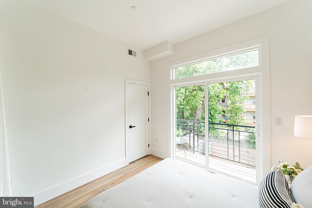 2517 Ontario Rd NW Unit 6, Washington, DC 20009 - bedroom with access to outside and light wood finished floors