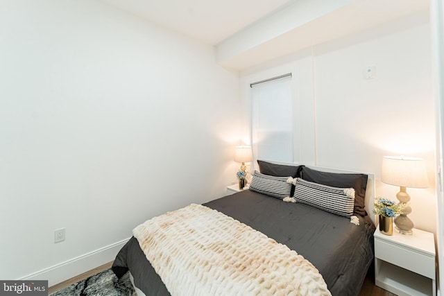 2517 Ontario Rd NW Unit 6, Washington, DC 20009 - bedroom with wood finished floors and baseboards