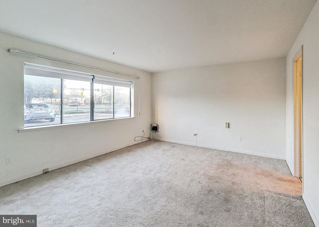 6 Monroe St Unit 6-101, Rockville, MD 20850 - carpeted empty room featuring baseboards