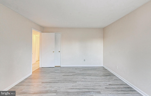 6 Monroe St Unit 6-101, Rockville, MD 20850 - empty room with baseboards and wood finished floors