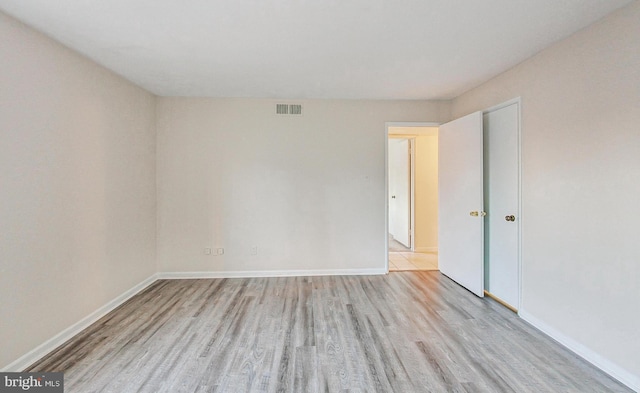 6 Monroe St Unit 6-101, Rockville, MD 20850 - unfurnished room with wood finished floors and baseboards