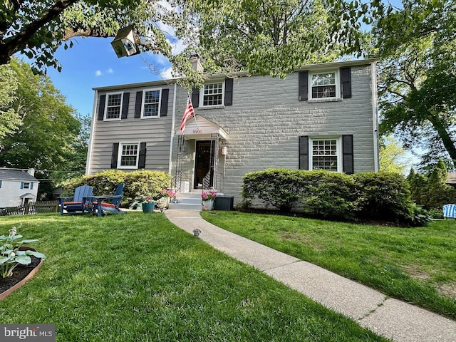 9900 Woodburn Rd, Silver Spring, MD 20901 - view of front of house with a chimney
