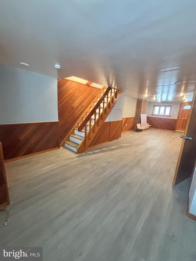 6226 Cardiff St, Philadelphia, PA 19149 - additional living space with wood walls, stairway, and wainscoting