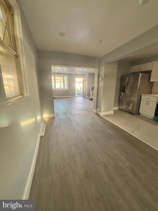 6226 Cardiff St, Philadelphia, PA 19149 - unfurnished living room with baseboards and light wood finished floors