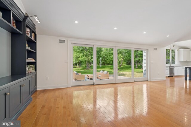 32 Gallup Rd, Princeton, NJ 08540 - unfurnished living room with light wood-style floors and recessed lighting