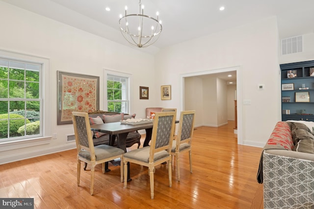 32 Gallup Rd, Princeton, NJ 08540 - dining room featuring a chandelier, light wood finished floors, plenty of natural light, recessed lighting, and a high ceiling