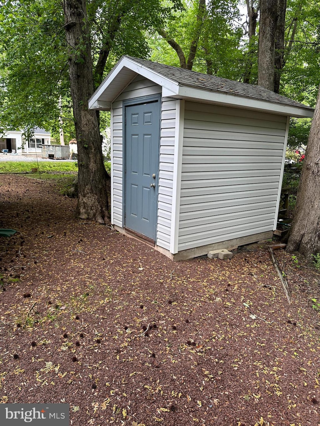 38 Garrett Dr, Ocean Pines, MD 21811 - view of shed featuring view of scattered trees