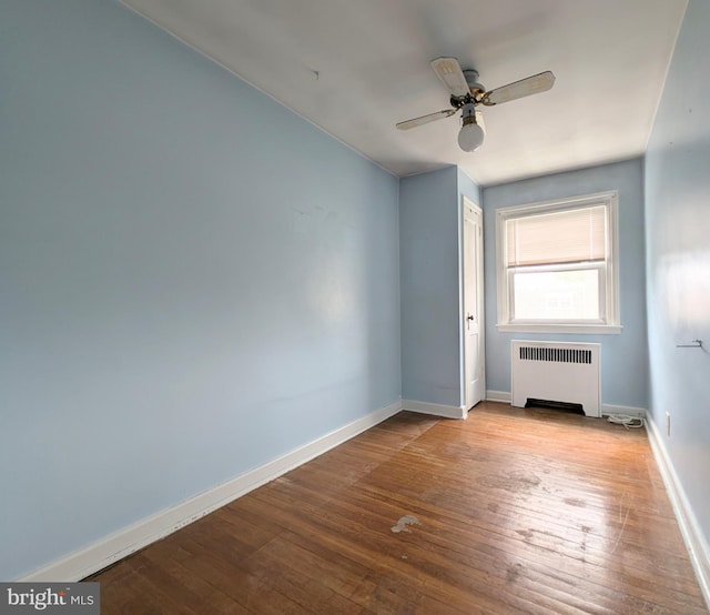3407 Verner St, Drexel Hill, PA 19026 - spare room featuring radiator, hardwood / wood-style floors, and ceiling fan