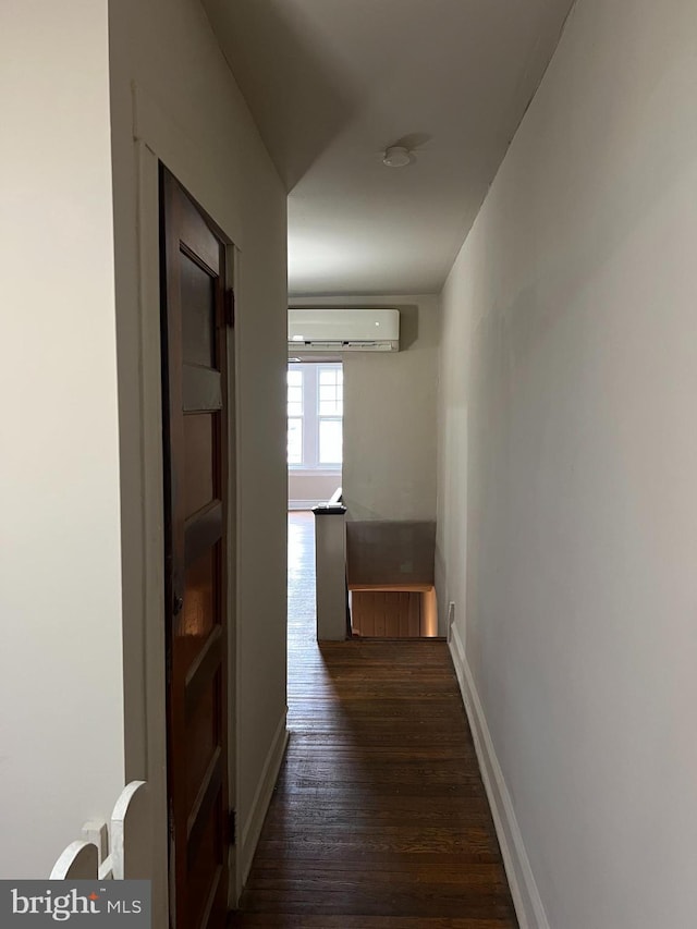 5224 Florence Ave, Philadelphia, PA 19143 - hall featuring a wall mounted AC, dark wood-type flooring, and baseboards