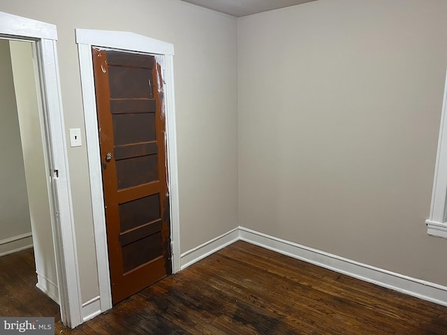 5224 Florence Ave, Philadelphia, PA 19143 - unfurnished room with dark wood finished floors and baseboards