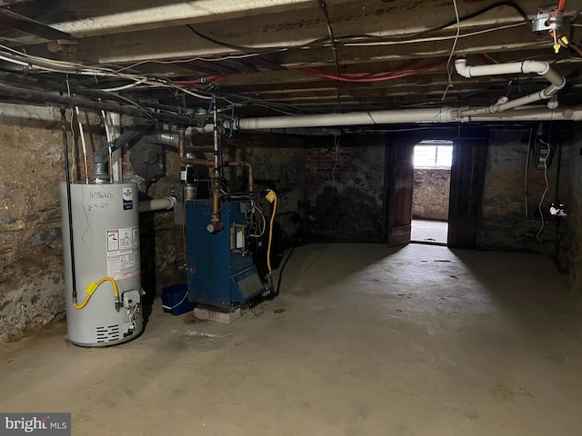 5224 Florence Ave, Philadelphia, PA 19143 - below grade area featuring gas water heater and a heating unit
