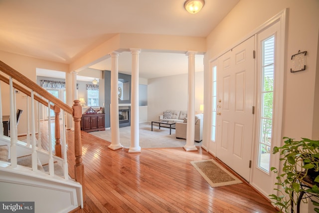 854 Hinchley Run, West Chester, PA 19382 - entrance foyer with decorative columns, light wood-style floors, and plenty of natural light