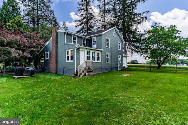 3645 N Susquehanna Trl, York, PA 17404 - view of front of home featuring a chimney and a front lawn