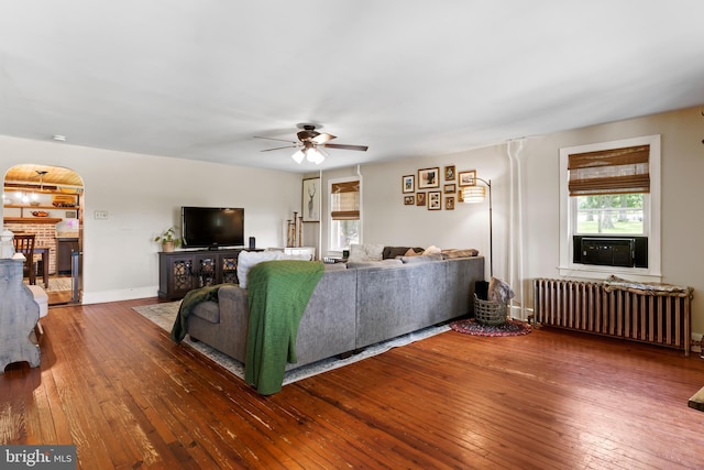 3645 N Susquehanna Trl, York, PA 17404 - living area with radiator, wood-type flooring, a ceiling fan, and baseboards