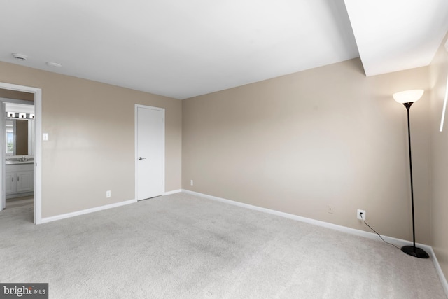 12001 Old Columbia Pike Unit 709, Silver Spring, MD 20904 - unfurnished bedroom featuring carpet flooring, baseboards, and connected bathroom