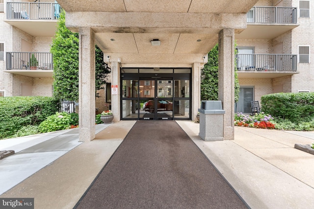 12001 Old Columbia Pike Unit 709, Silver Spring, MD 20904 - property entrance featuring brick siding and french doors
