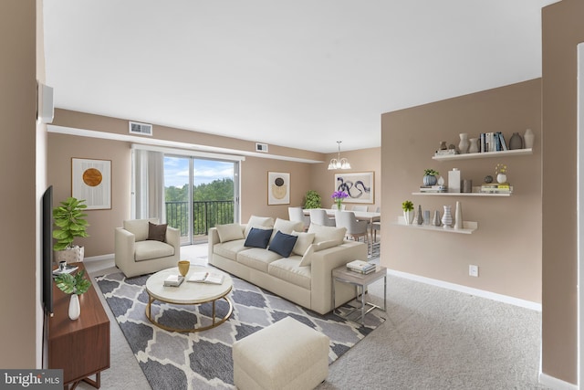 12001 Old Columbia Pike Unit 709, Silver Spring, MD 20904 - carpeted living room with baseboards and a chandelier
