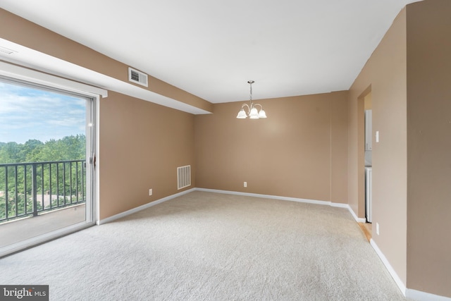 12001 Old Columbia Pike Unit 709, Silver Spring, MD 20904 - empty room with carpet flooring, baseboards, and a chandelier
