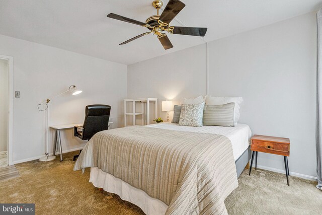 1300 Army Navy Dr S Unit 227, Arlington, VA 22202 - carpeted bedroom with baseboards and a ceiling fan