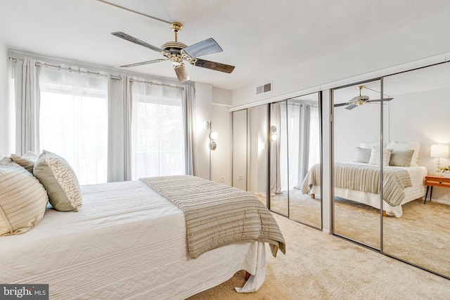 1300 Army Navy Dr S Unit 227, Arlington, VA 22202 - bedroom featuring carpet and ceiling fan