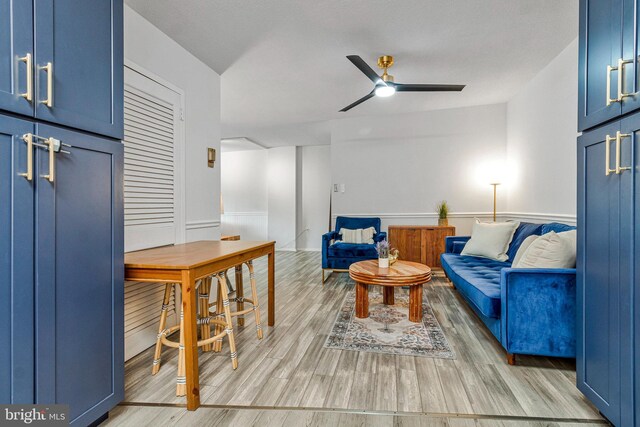 1300 Army Navy Dr S Unit 227, Arlington, VA 22202 - living area featuring light wood finished floors and ceiling fan