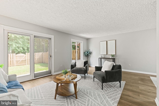 2825 Cambridge Dr, Woodbridge, VA 22192 - living room with wood finished floors and a textured ceiling