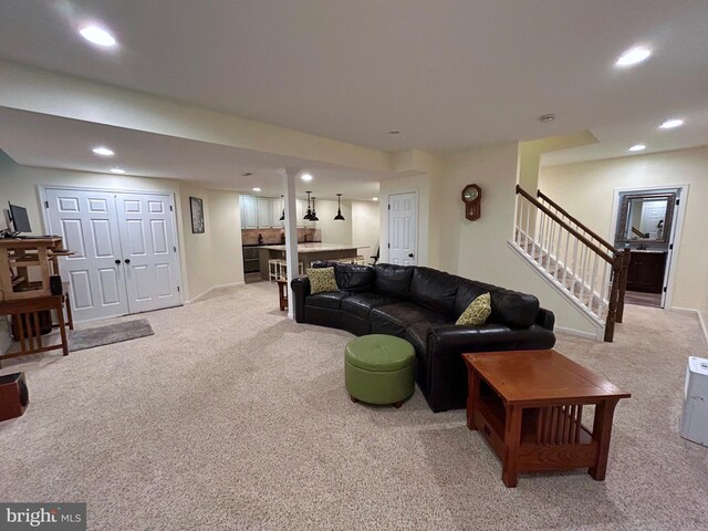 25 Baldwin Cir, Glenmoore, PA 19343 - living area with carpet flooring, stairway, and recessed lighting