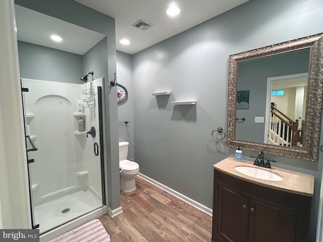 25 Baldwin Cir, Glenmoore, PA 19343 - bathroom with a stall shower, wood finished floors, and vanity