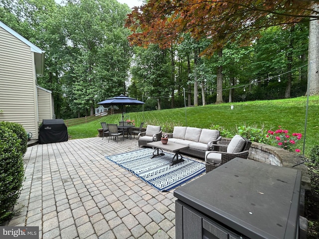 25 Baldwin Cir, Glenmoore, PA 19343 - view of patio / terrace with area for grilling, an outdoor hangout area, view of wooded area, and outdoor dining space