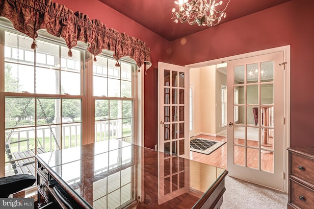 66 Light Farm Dr, Cochranville, PA 19330 - doorway to outside with a chandelier and carpet flooring