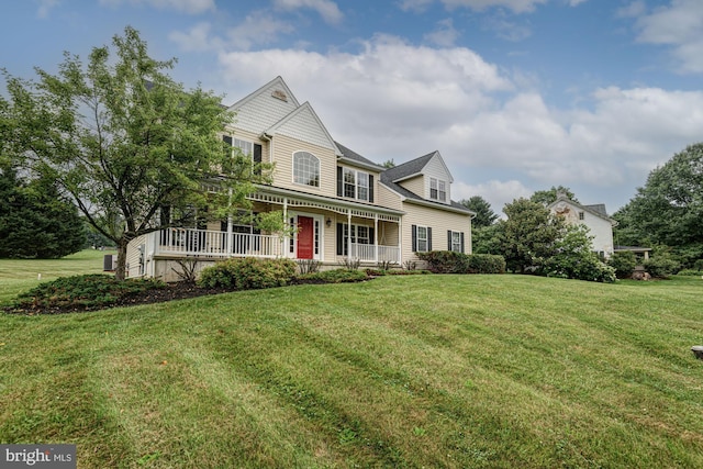 66 Light Farm Dr, Cochranville, PA 19330 - view of front facade featuring covered porch and a front yard