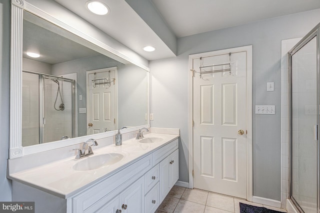 66 Light Farm Dr, Cochranville, PA 19330 - full bath with tile patterned flooring, double vanity, a shower stall, and recessed lighting