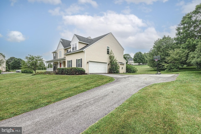 66 Light Farm Dr, Cochranville, PA 19330 - view of side of home featuring a garage, driveway, and a lawn