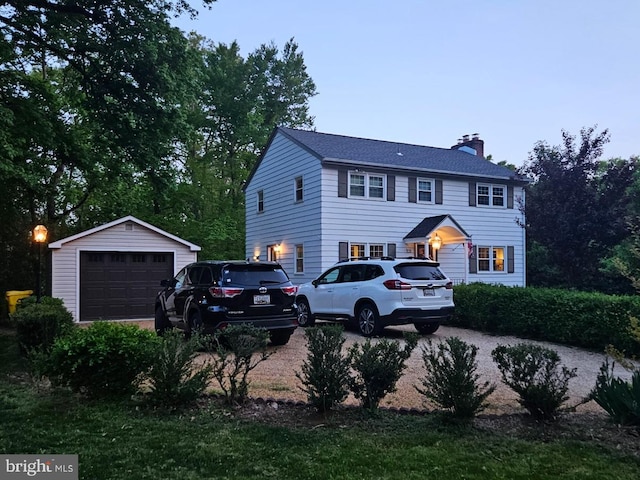 27 Cascade Rd, Arnold, MD 21012 - colonial-style house featuring an outdoor structure, a garage, and a chimney