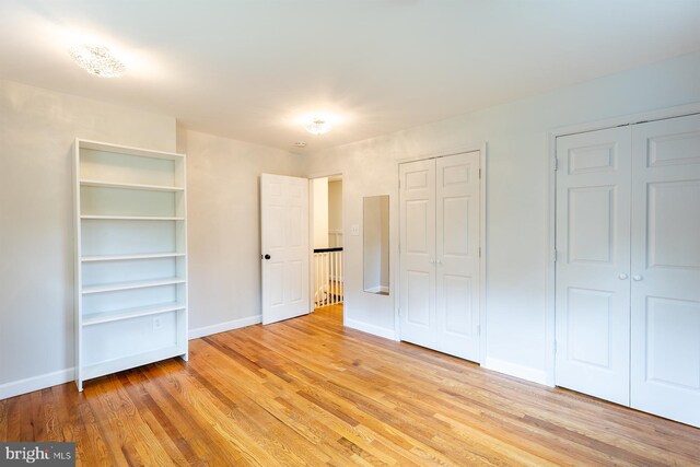 27 Cascade Rd, Arnold, MD 21012 - unfurnished bedroom featuring two closets and light wood-type flooring