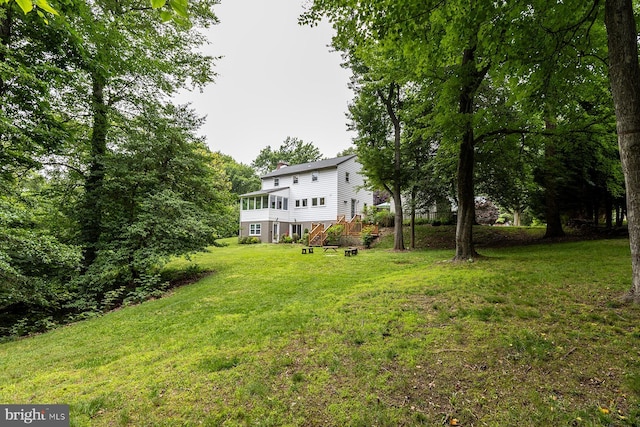 27 Cascade Rd, Arnold, MD 21012 - view of green lawn with a deck and stairs