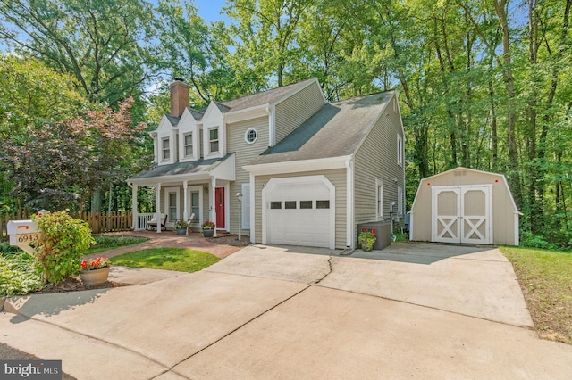 6943 Deer Run Dr, Alexandria, VA 22306 - view of front of property featuring a porch, an attached garage, a shed, a chimney, and concrete driveway