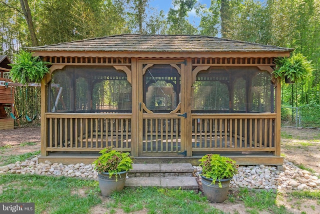 6943 Deer Run Dr, Alexandria, VA 22306 - view of outdoor structure featuring a sunroom